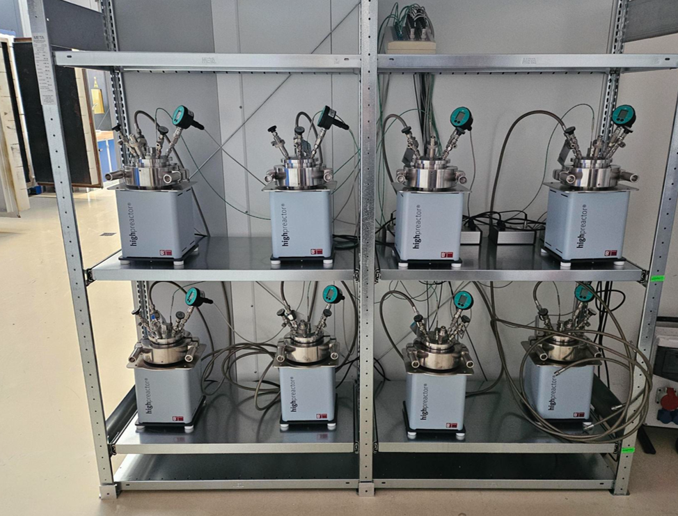 Test bench with eight autoclaves for accelerated stress tests and aging experiments.